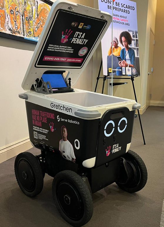 Campaign graphics wrapped on a Serve Robotics delivery robot