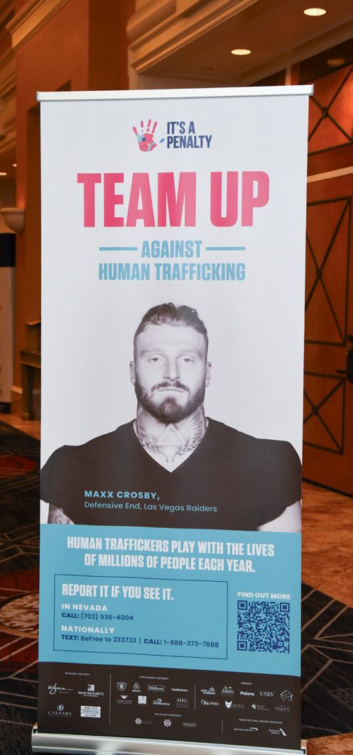 'Team Up against human trafficking' roller banner